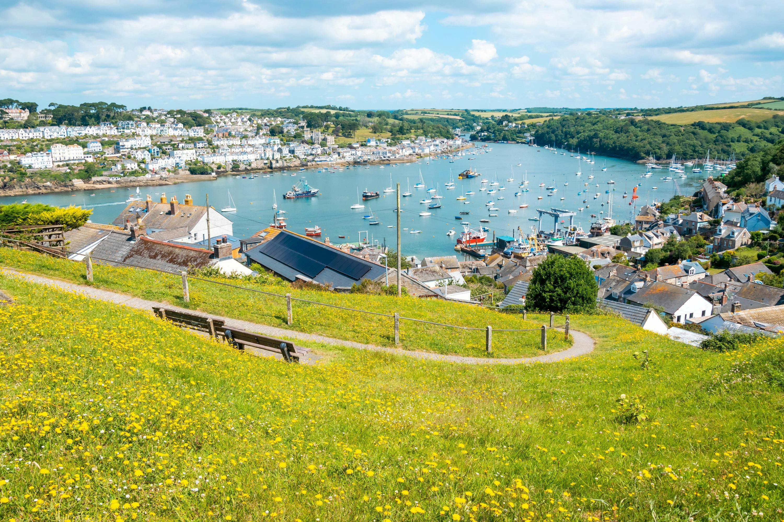 Beautiful Cornish harbour town of Fowey and Polruan, with boats moored in Fowey Estuary, Cornwall, England.