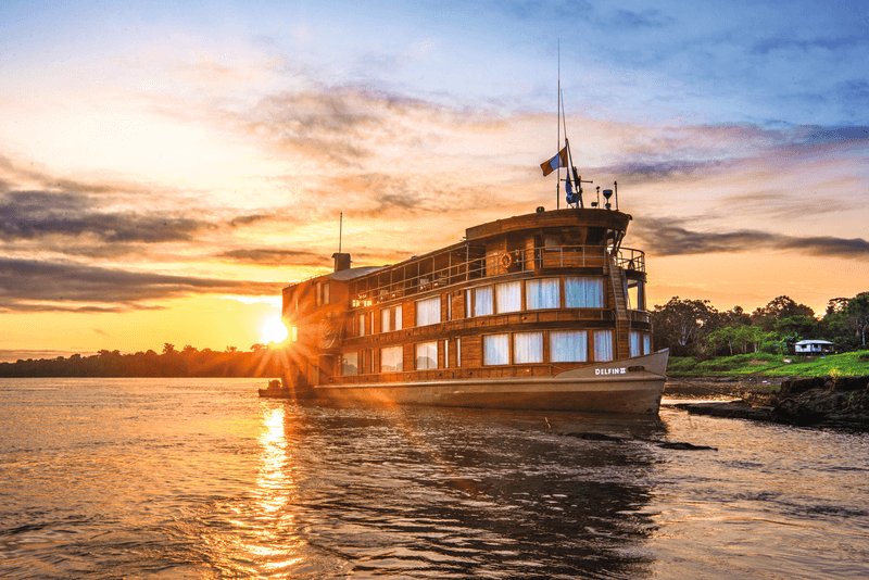 Delfin II docked along the Pucate river, Upper Amazon, Peru