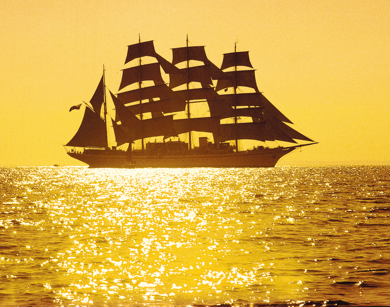 Sunset on the ship Sea Cloud at full sail 