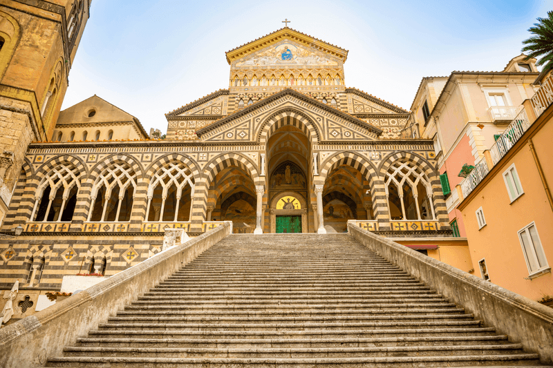 View of main entrance to Cathedral of St Andrea and the steps leading to it, Amalfi in Italy