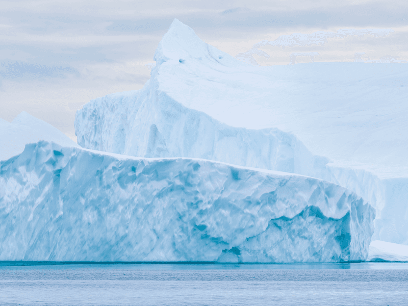 Huge icebergs from the Ilulissat Icefjord stranded on a former terminal moraine just outside Ilulissat, Greenland.