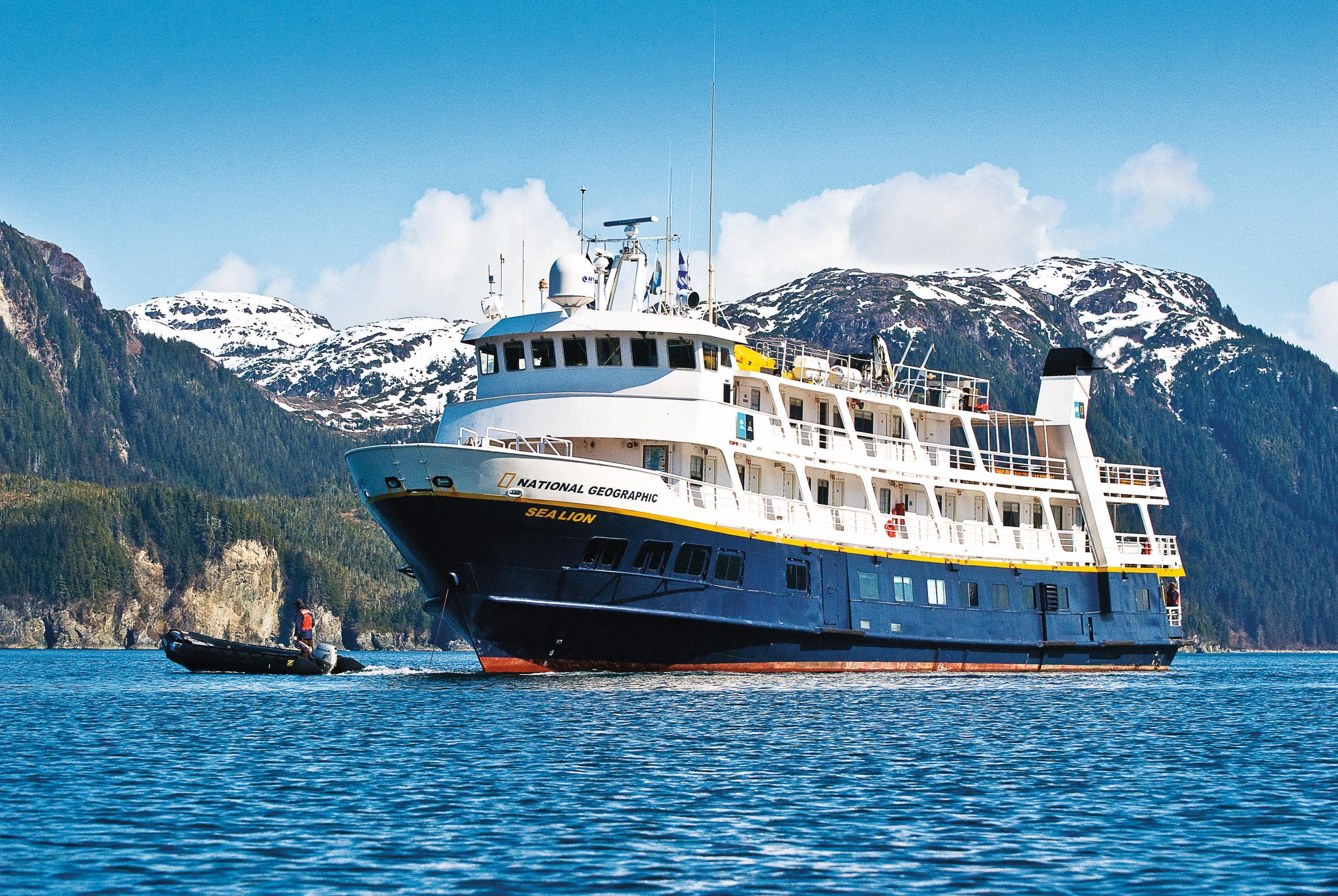 Staff departs the ship, National Geographic Sea Lion, by zodiac in Alaska, USA