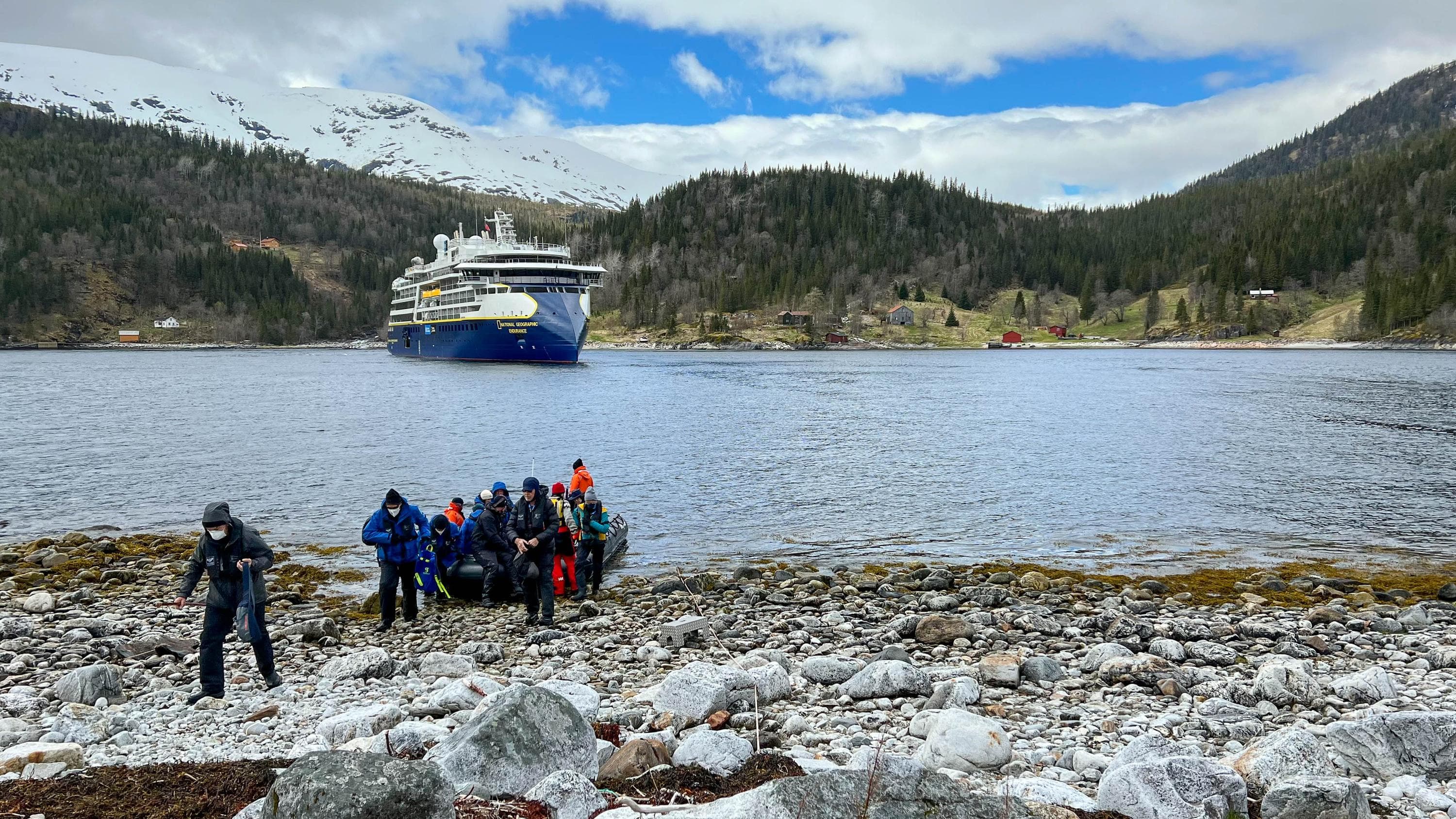 The National Geographic Endurance in Dynamic Positioning with staff ashore in StorbØrja, Norway.