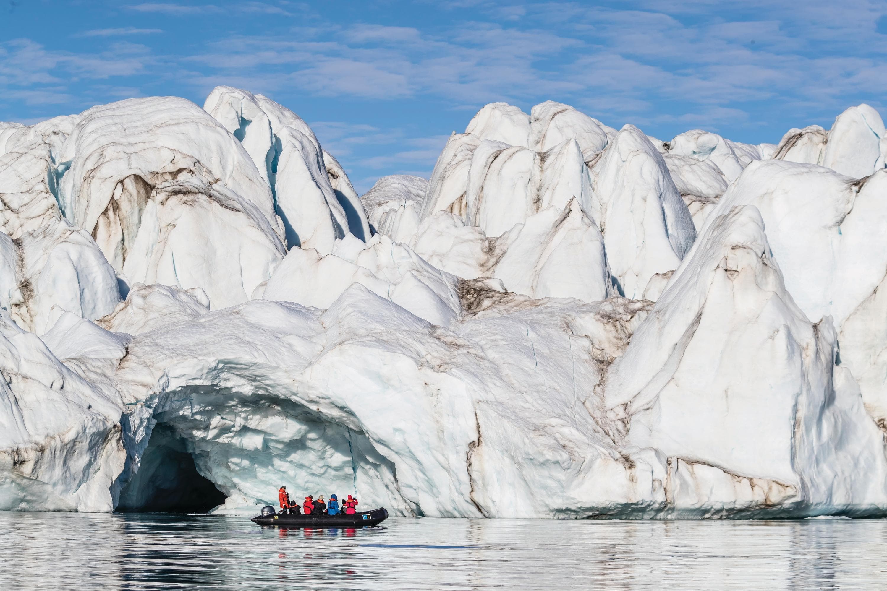 Guests exploreby Zodiac in the calm waters of Makinson Inlet, Ellesmere Island, Nunavut, Canada