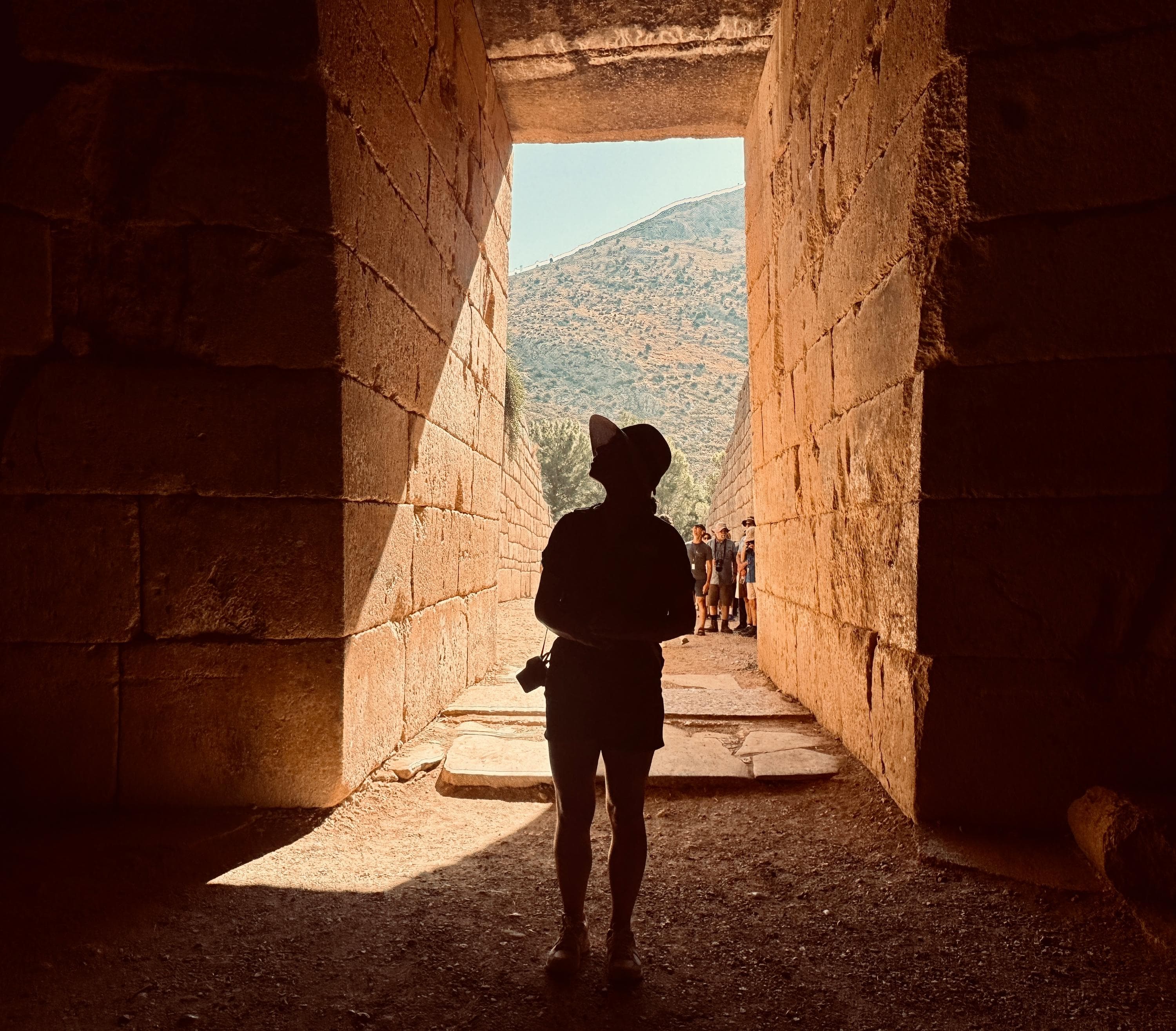 A guest exploring the Micenae settlement, Peloponnese, Greece.