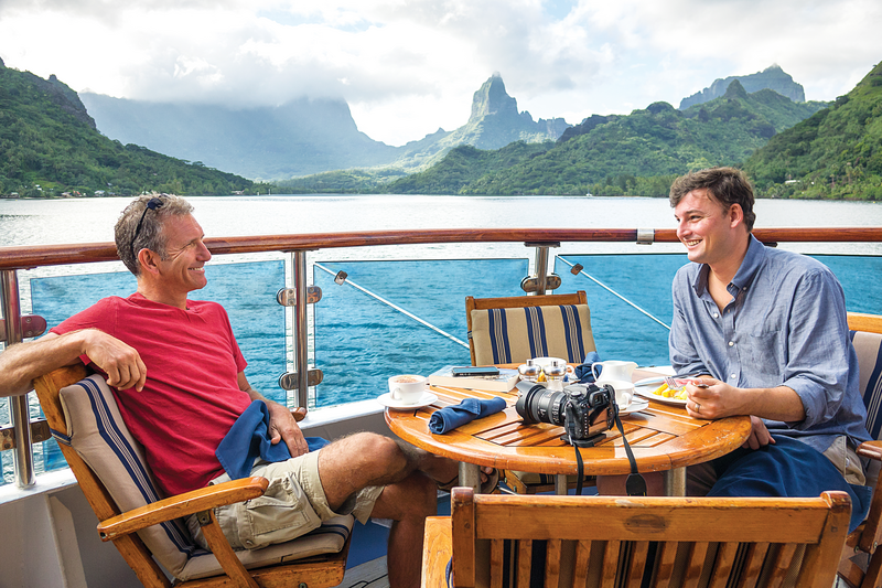 Marc Cappelletti and Carl Hoffman in Moorea aboard the ship National Geographic Orion
