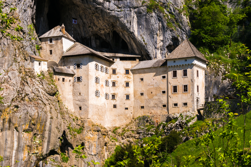 The unique and famous Predjama Castle in Slovenia. The renaissance castle was built within a cave mouth to offer best protection.