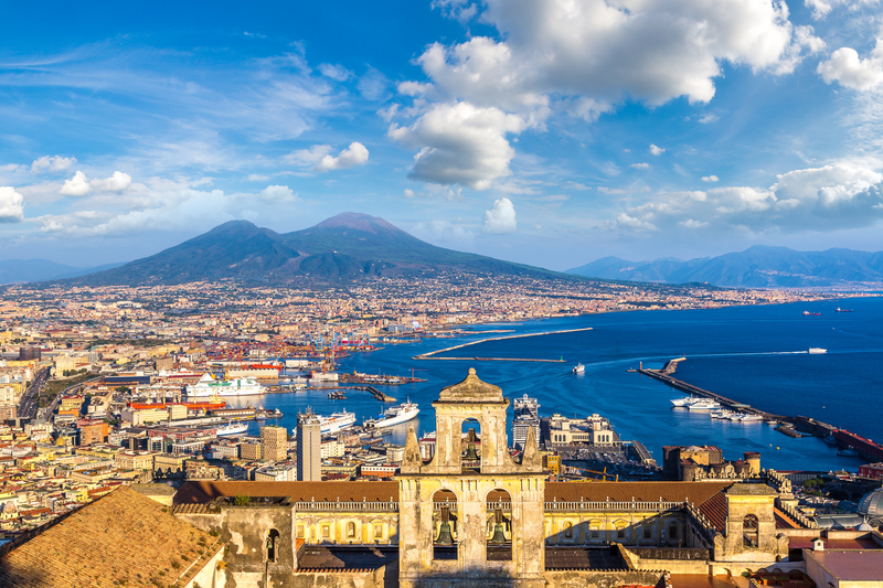Naples and mount Vesuvius in the background at sunset in a summer day, Campania, Italy