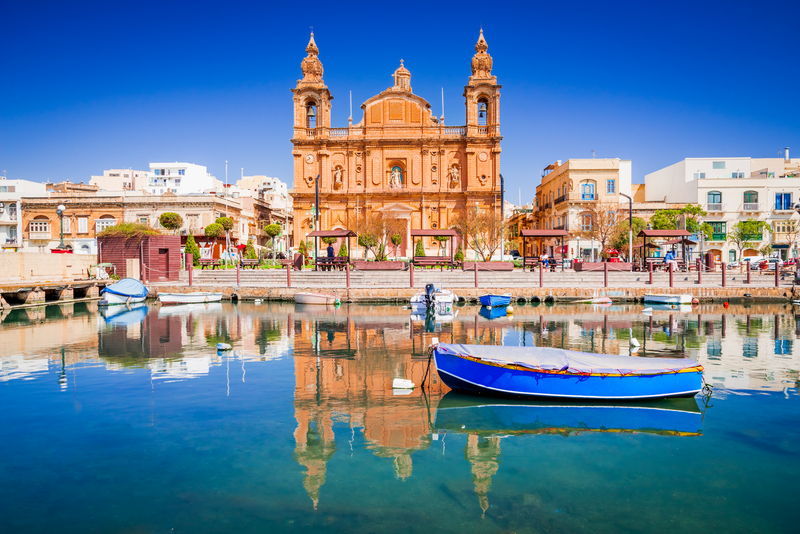 Msida Marina boat and church reflection into water, Valletta, Malta