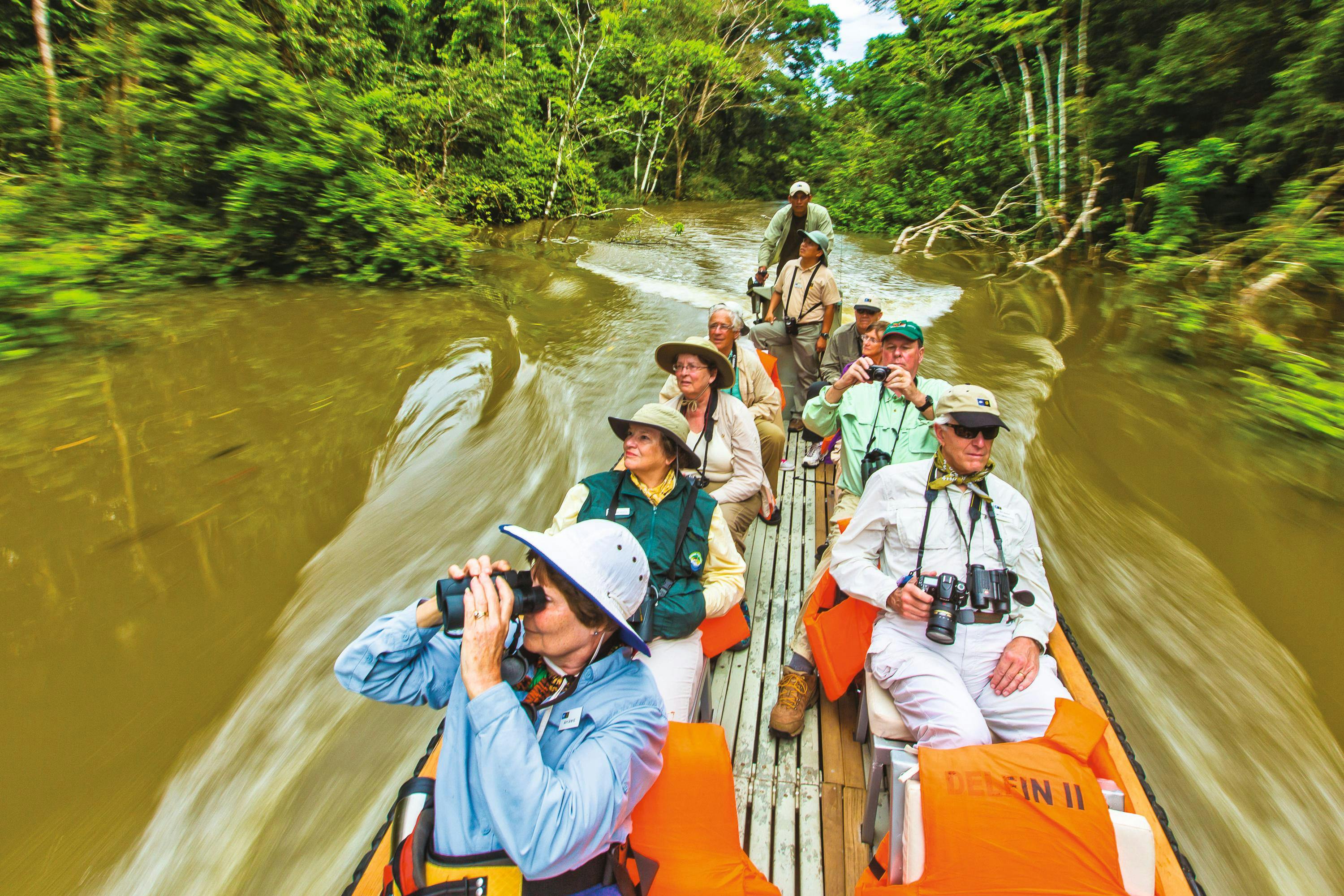 Guests exploring by skiff, Pacaya-Samiria National Reserve, Amazon River, Peru