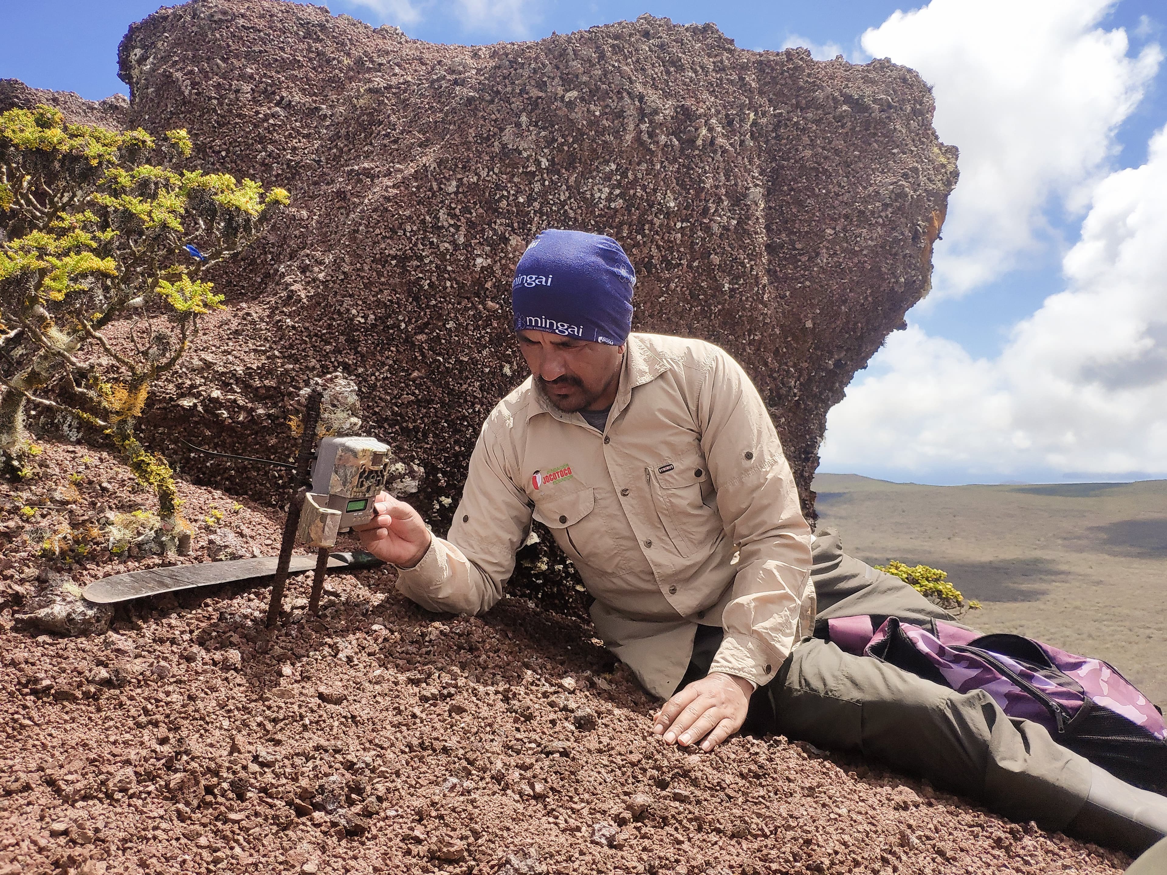 Image009.A researcher from Fundación de Conservación Jocotoco measures ground readings in Galápagos.
