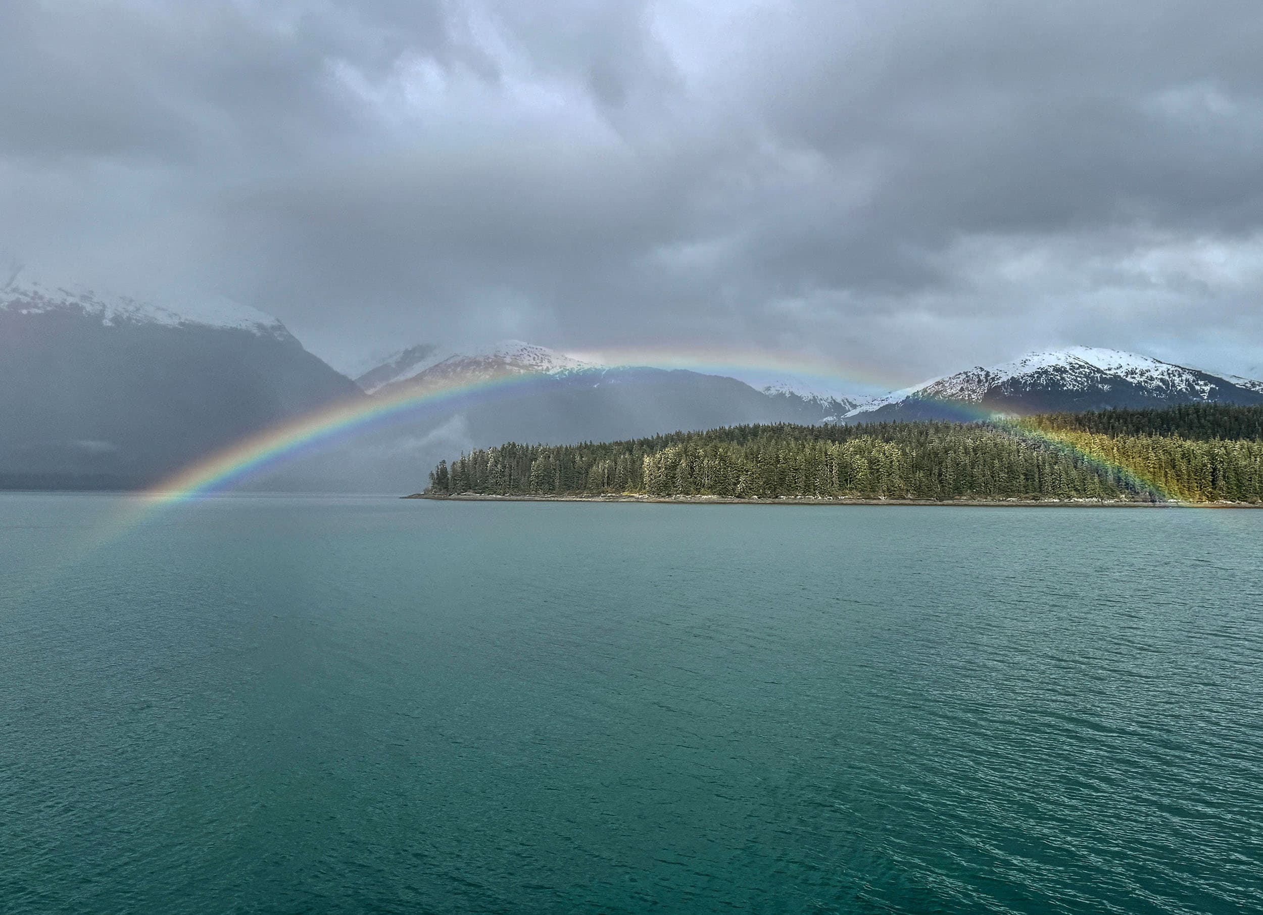 a rainbow over water