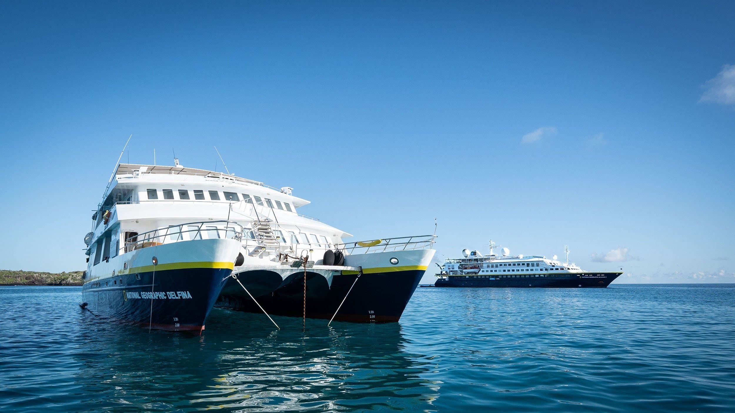 two ships anchored next to each other