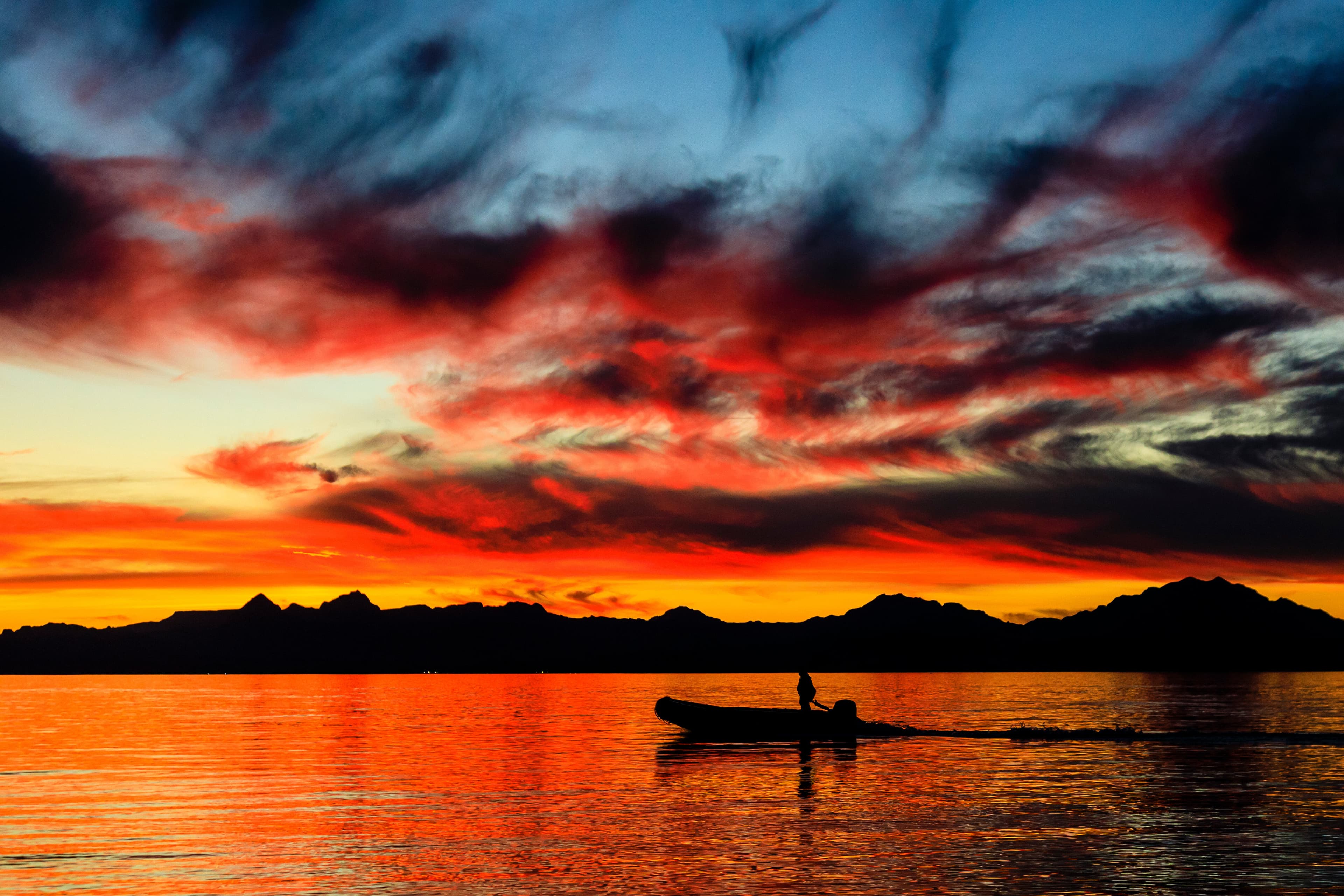 Zodiac crusing during sunset, Isla del Carmen, Gulf of Mexico, Baja California, Mexico.