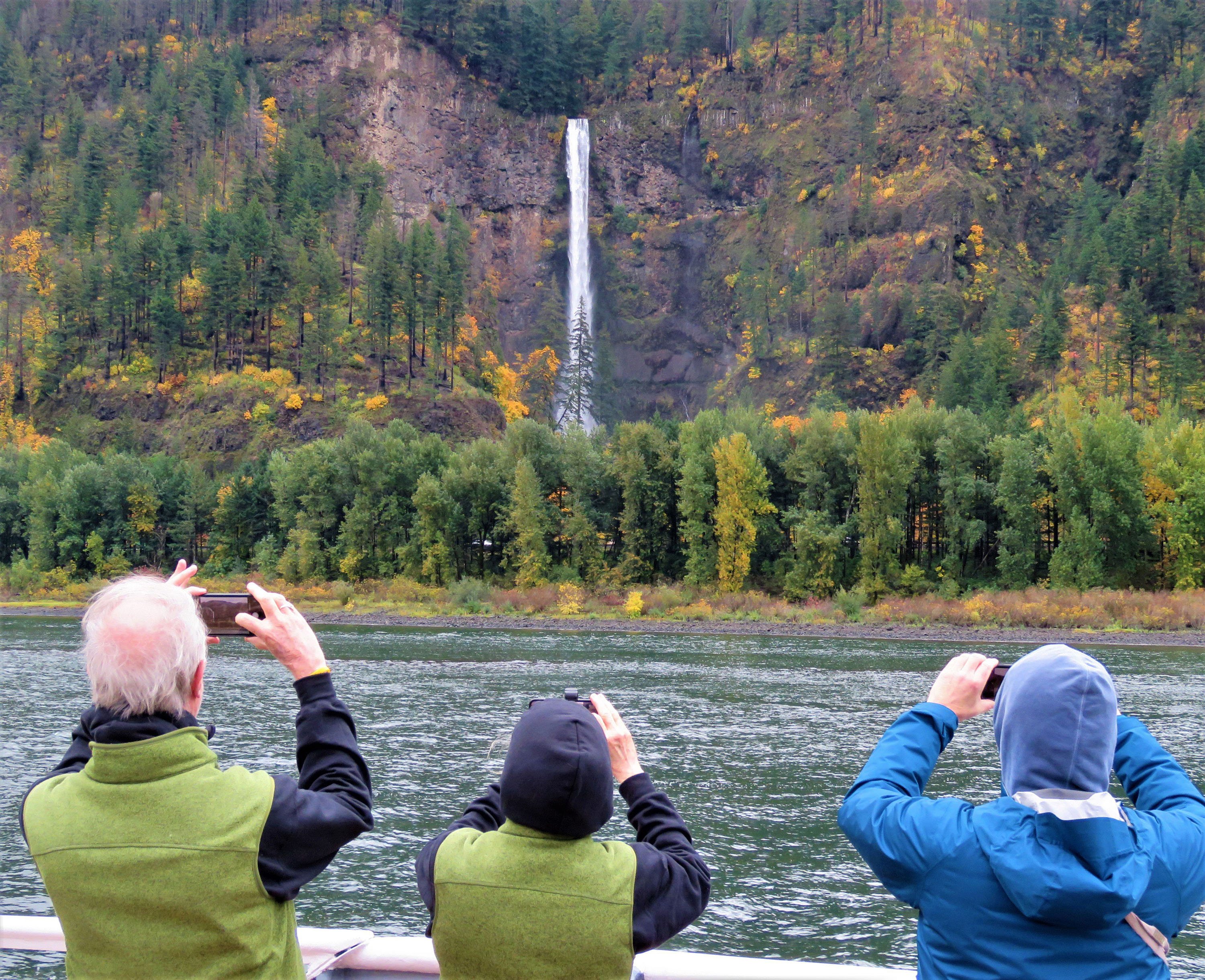 guests photographing multnomah falls