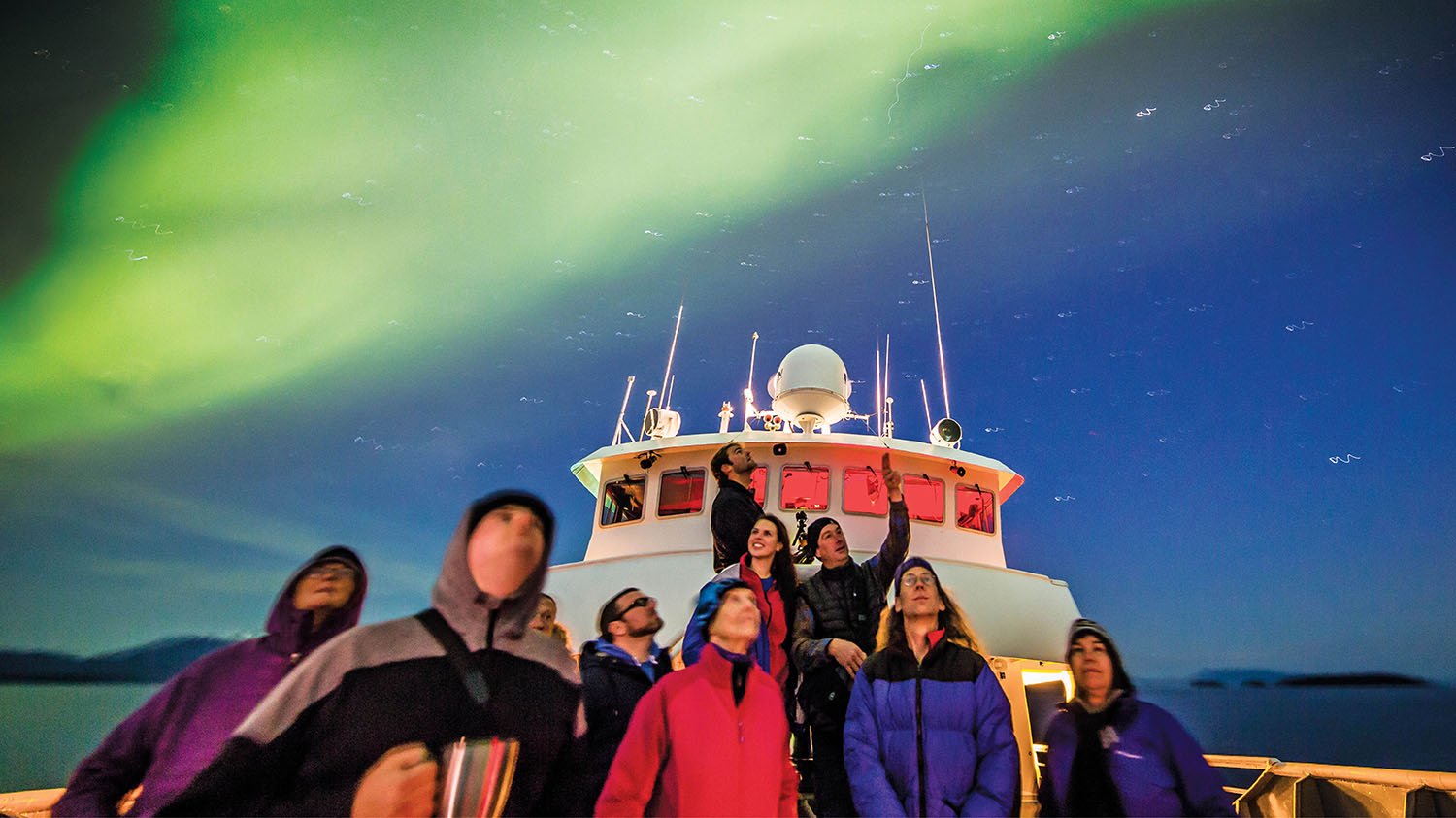 people viewing northern lights
