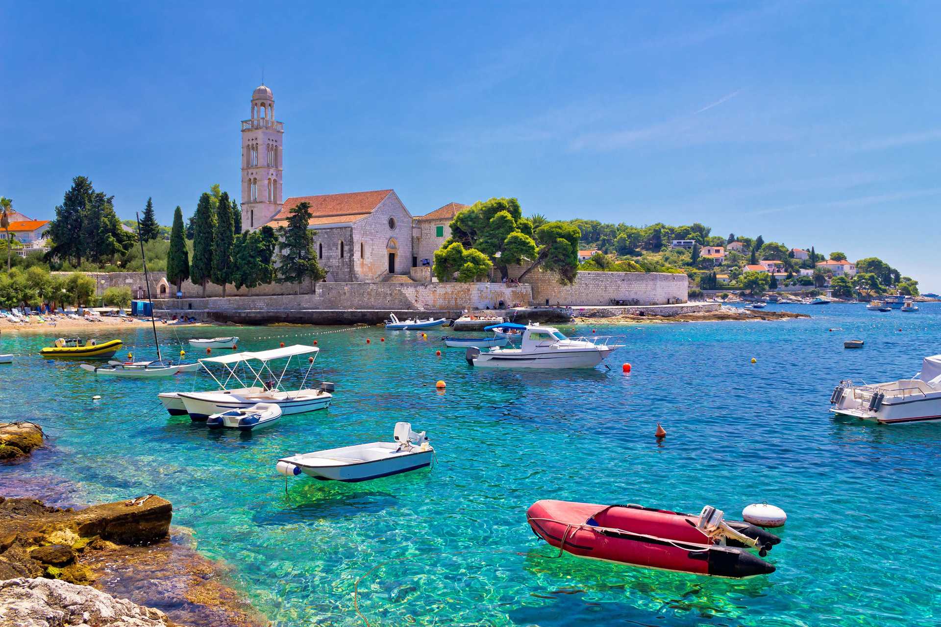 Turquoise sea of Hvar island, Franciscan monastery view in Split-Dalmatia, Croatia.