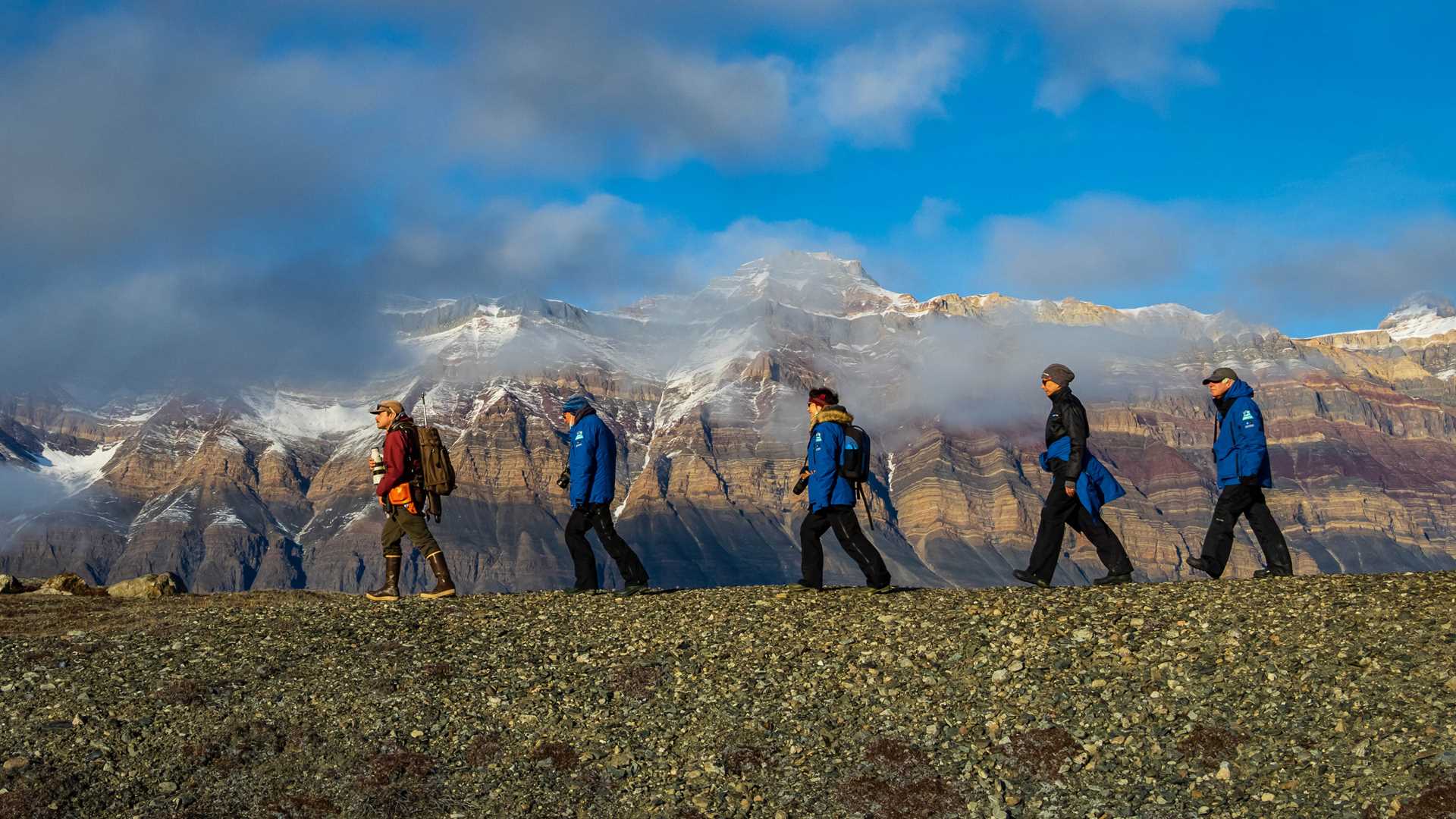 Hikers at Alpejord Fjord, Greenland