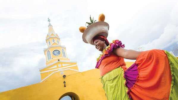 A Palenquera woman selling fruits in Cartagena, Colombia