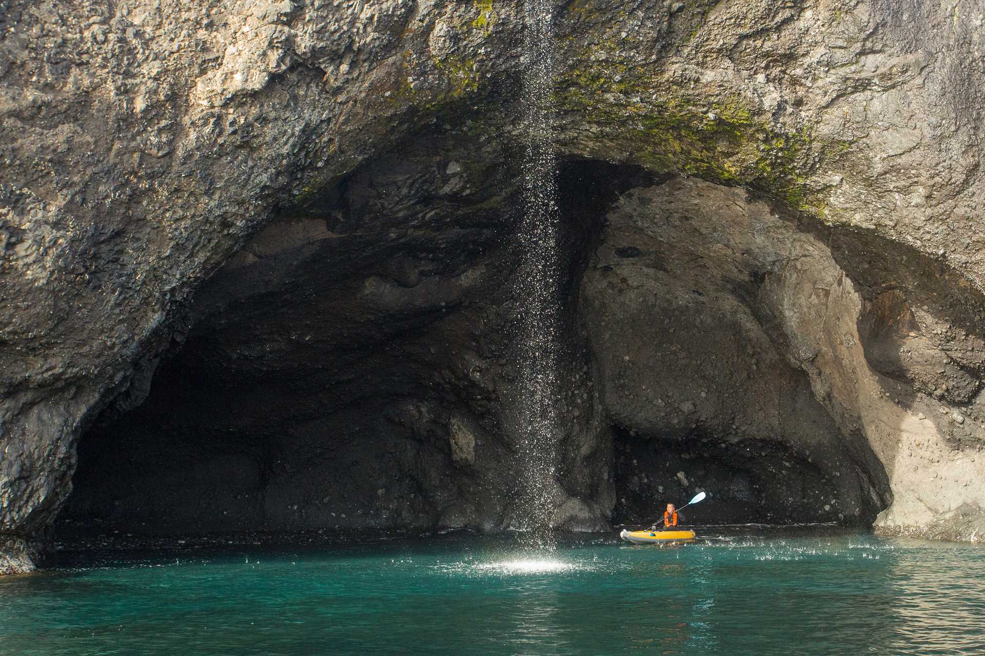 A guest explores by kayak in Ellesmere Island, Nunavut, Canada.